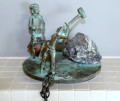Guard watching over chained Prisoner